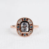 multi color diamonds, light blue sapphire ring